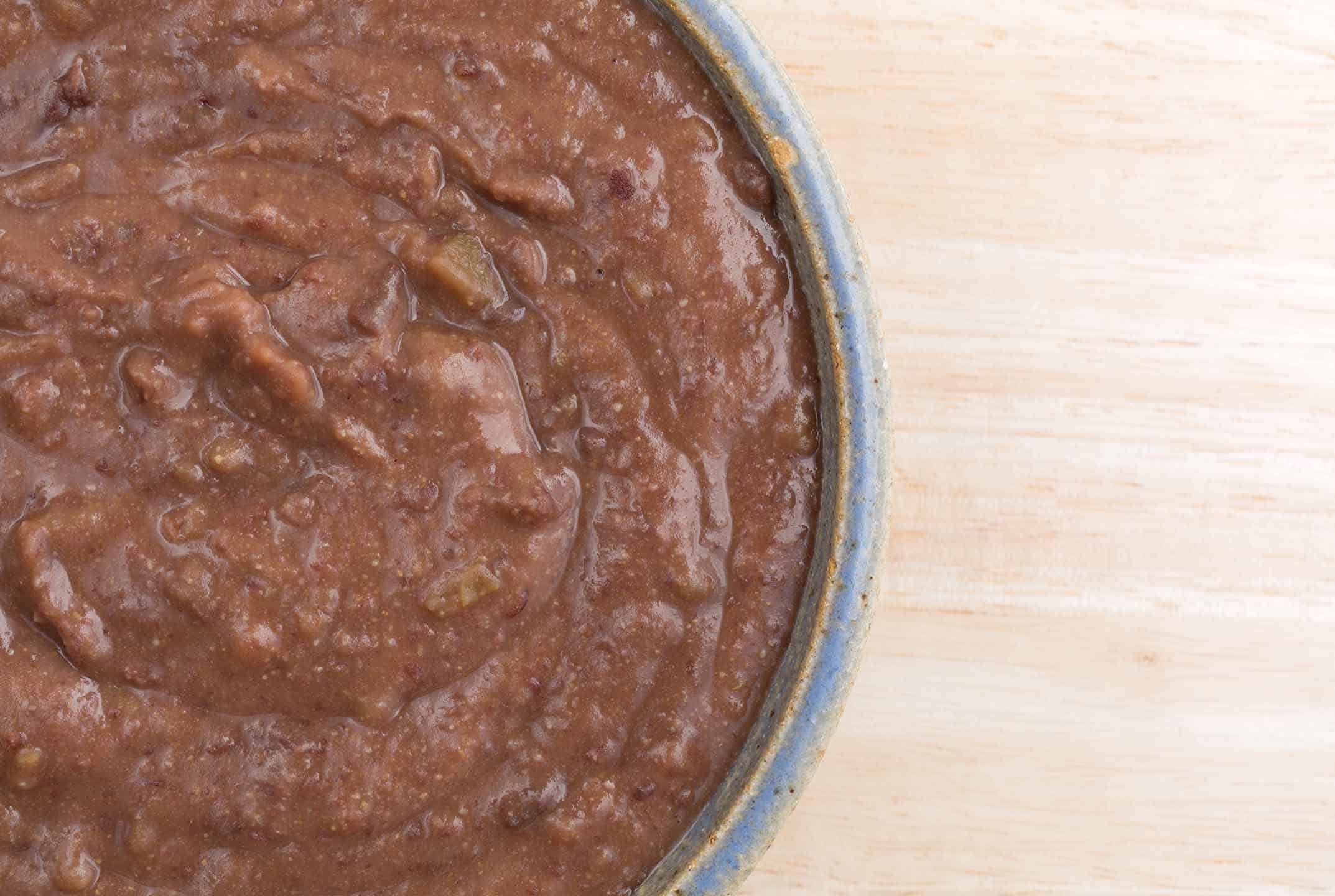 Black bean dip in a bowl on a wood table