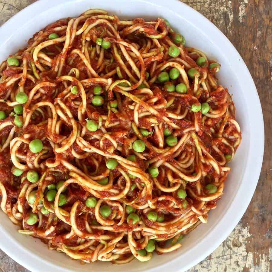 zoodles with green peas and spaghetti sauce