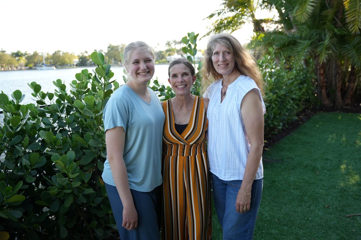 Aliese with her Mom and her Coach